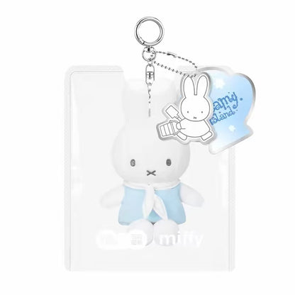 White Miffy Dream Island plush mascot in a light-blue outfit, with a keyring and illustrated tag.