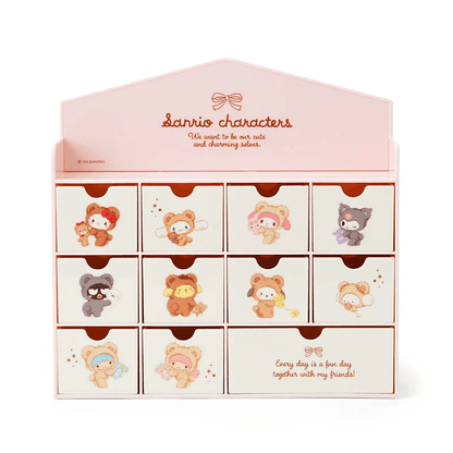 Pink Sanrio character storage box with small illustrated drawers and an everyday display layout.