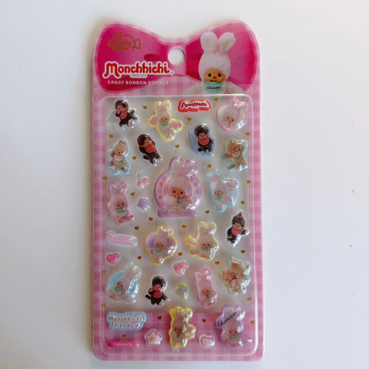 Monchhichi Candy BONBON 3D sticker sheet in pink packaging with Chimutan rabbits, Monchhichi characters, hearts and flowers.