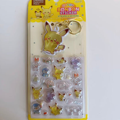 Pokémon Candy BONBON sticker and keyring set in yellow packaging with a large Pikachu keyring and raised character stickers.
