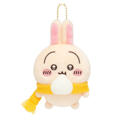 Usagi plush bag charm wearing a yellow scarf with a white steamed bun at his mouth and a gold ball chain.