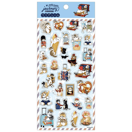 Mofusand Journey clear sticker sheet with cats in travel-inspired costumes, including a London guard and detective, on blue packaging.