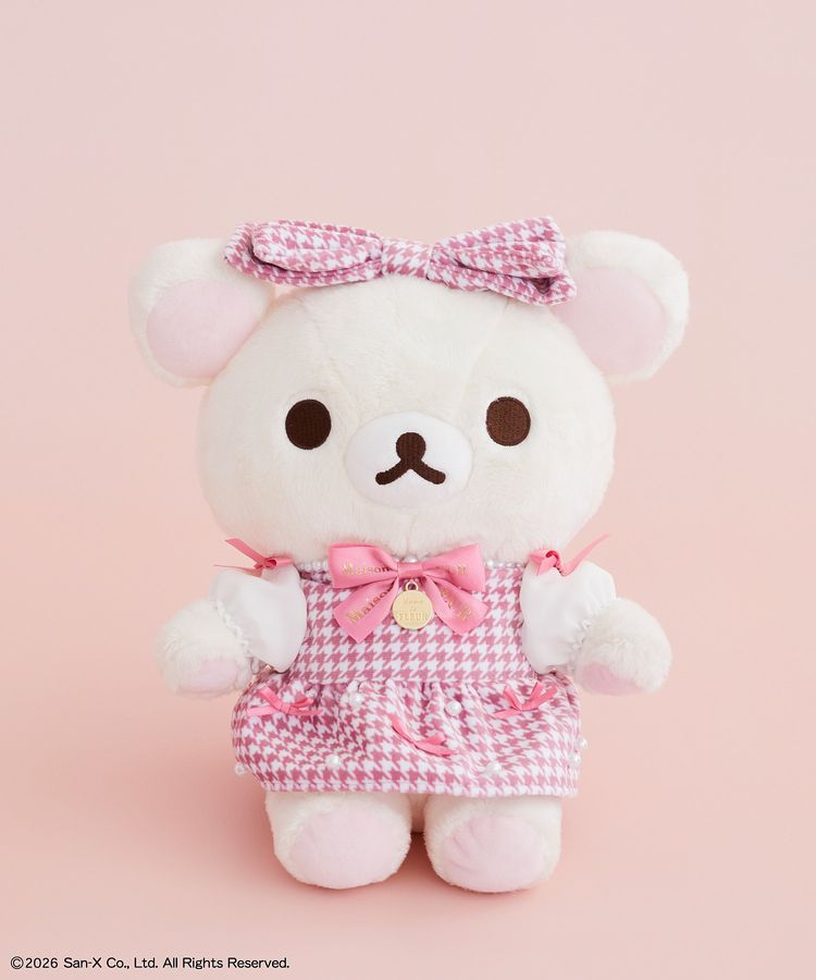 Korilakkuma x Maison de FLEUR M special plush with a large pink houndstooth head bow, matching dress, white sleeves and a pink logo ribbon.